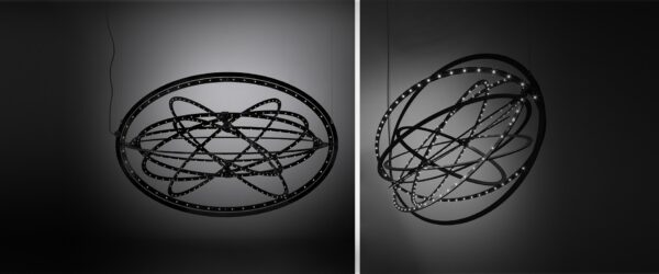 Elegante Artemide Copernico Pendelleuchte mit modernem Design und flexiblen Gelenkarmen.