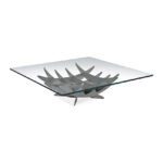 Eleganter Couchtisch Atlas mit Glasplatte und modernem Metallgestell von Cattelan Italia.