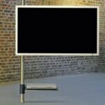 Elegante Wissmann Post 129 TV-Standsäule mit drehbarer Halterung für moderne Wohnräume.