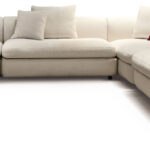 Luxuriöses Cantori Gabrielle Sofa mit eleganten geschwungenen Linien und hochwertigem Stoffbezug.