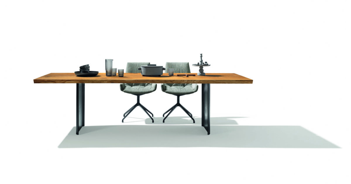 Moderner Team 7 Echt.Zeit Esstisch aus massivem Naturholz mit elegantem Design.