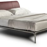 Elegantes Cantori Iseo Bett mit geschwungenem Kopfteil und luxuriösem italienischem Design.