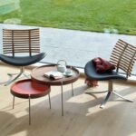 Eleganter Naver Sessel mit stilvollem Gepardenmuster für modernes Wohnen.