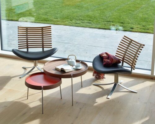 Eleganter Naver Sessel mit stilvollem Gepardenmuster für modernes Wohnen.