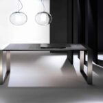 Eleganter Orsenigo Tischring aus poliertem Edelstahl für stilvolle Tischdekoration.