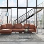Elegantes hellgraues Sofa mit modernem Design für stilvolle Wohnzimmer.