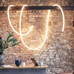 Artemide La Linea 4 LED-Pendelleuchte in modernem, minimalistischem Design für stilvolle Beleuchtung.