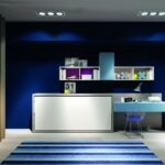 Platzsparendes Schrankbett Kali 90 mit integriertem Sofa von Clei für kleine Wohnräume.