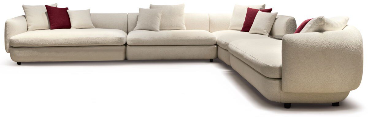 Luxuriöses Cantori Gabrielle Sofa mit eleganten geschwungenen Linien und hochwertigem Stoffbezug.